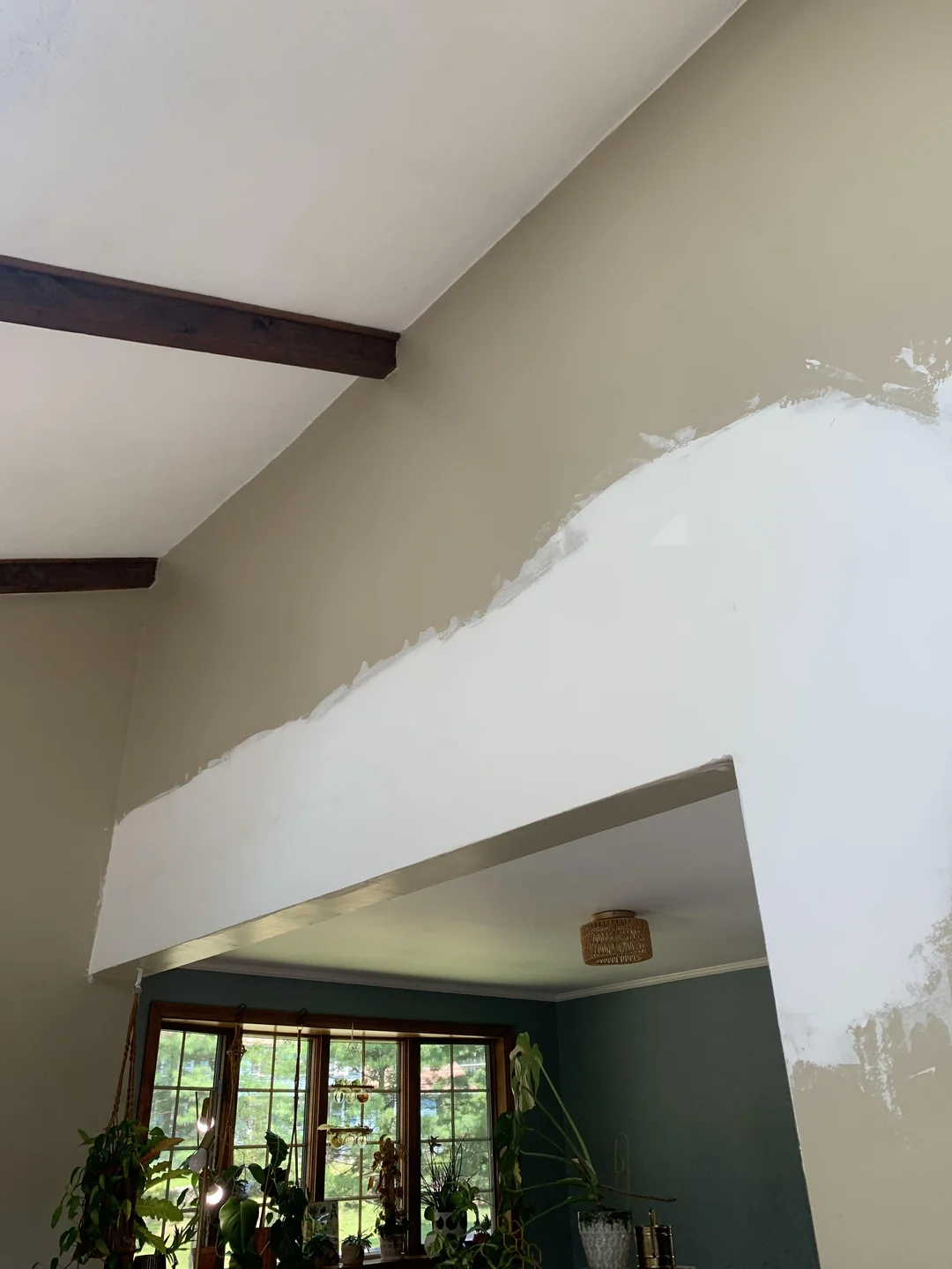Wide interior opening with drywall compound and finish preparation